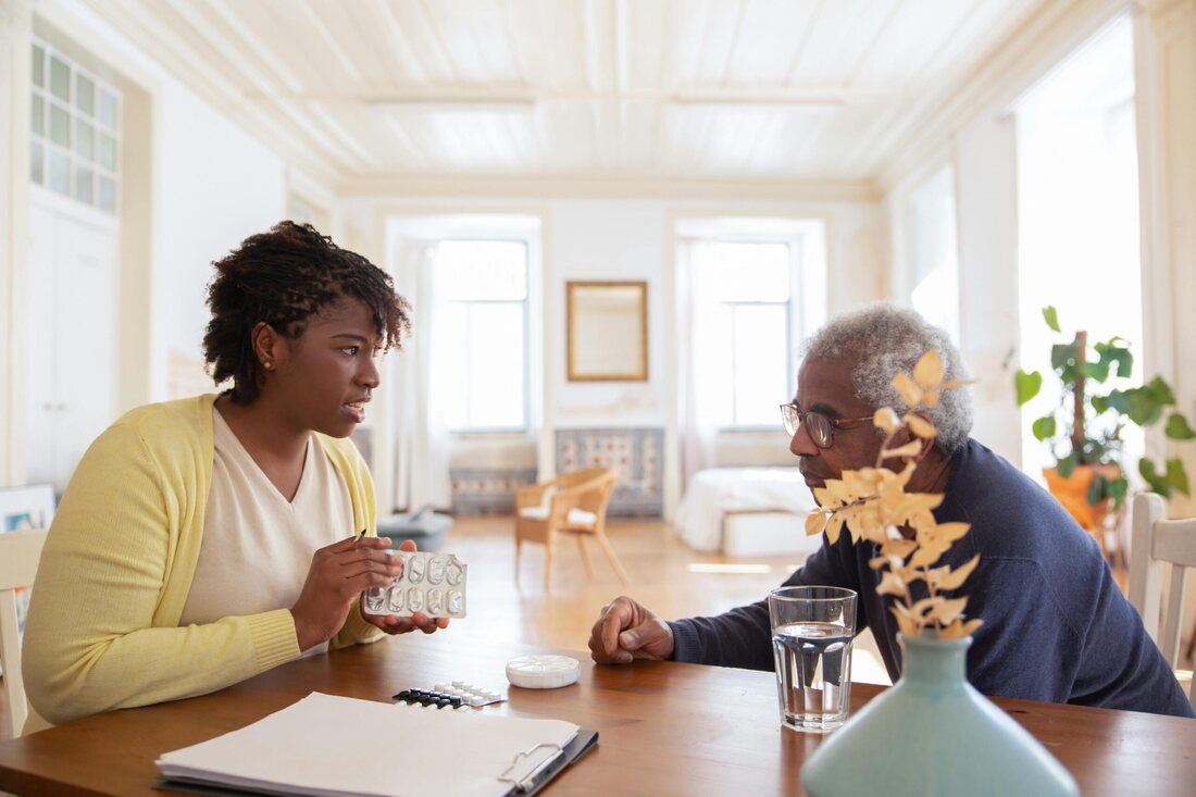 Caregiver providing respectful support to an older adult